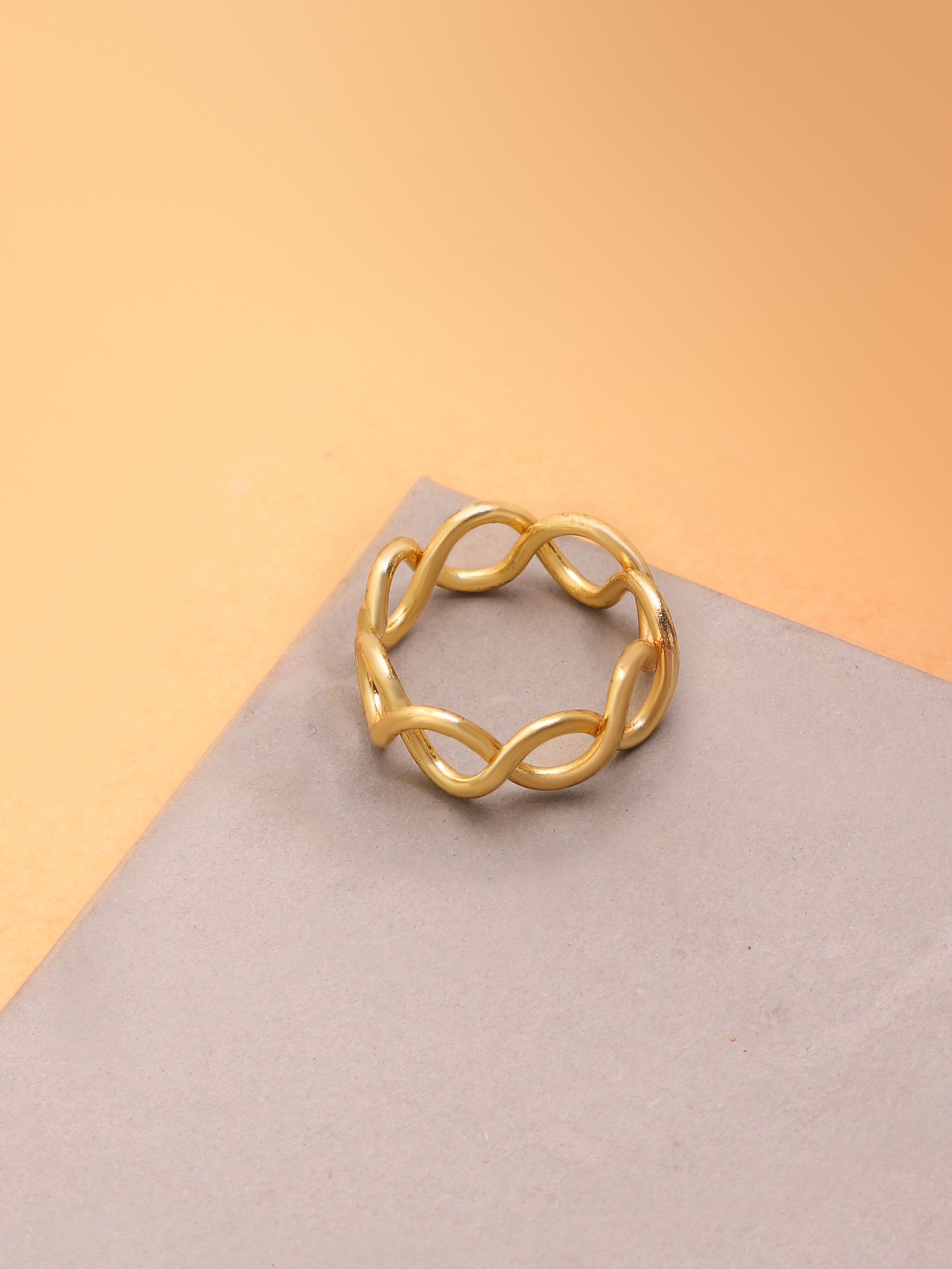 Offers Couple of Statement Brass String Rings